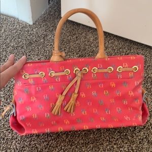 Raspberry Dooney and Bourke tassel bag